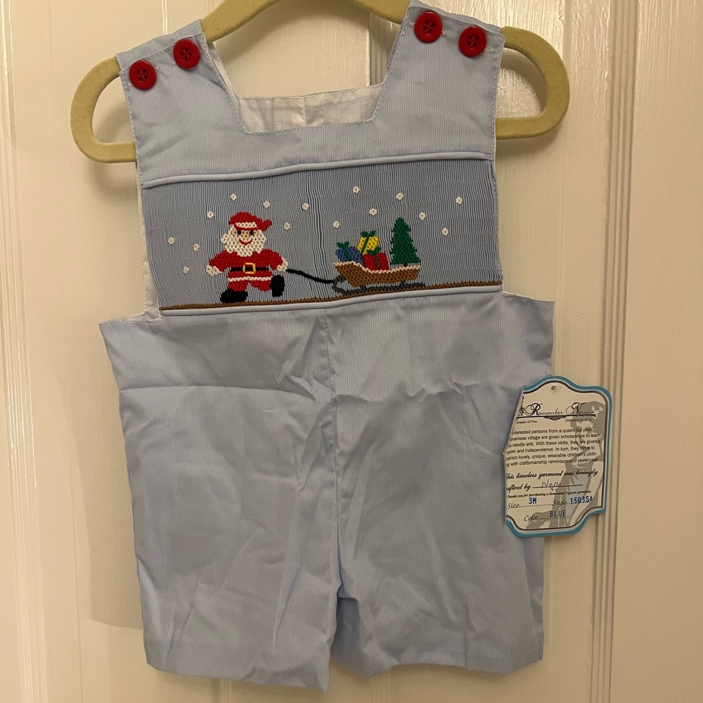 New with tags light blue smocked Christmas jon jon with red buttons